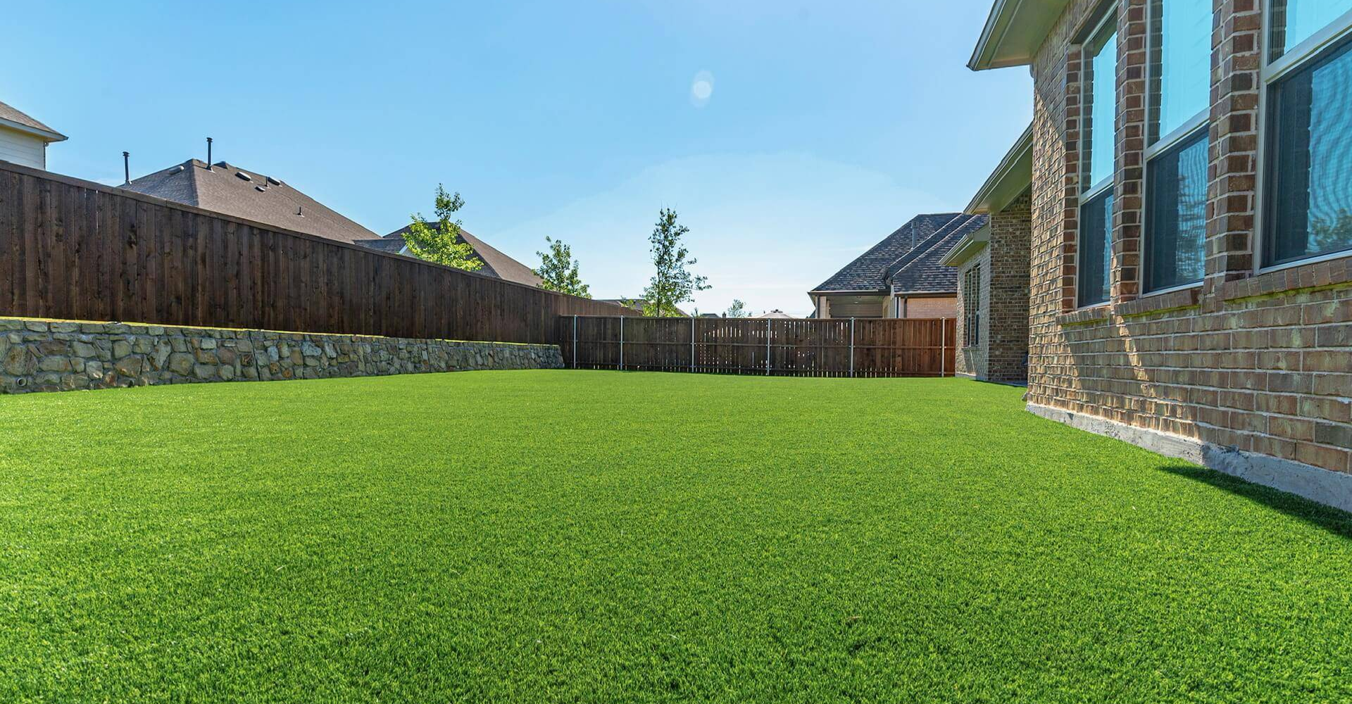 What Makes Artificial Grass Ideal for Residential Lawns?